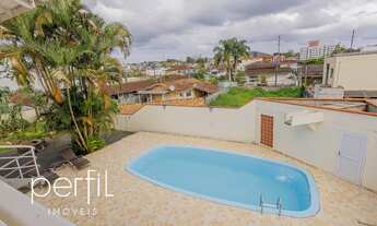 Imagem 4: Sobrado com 4 dormitórios sendo 2 suítes e 1 suíte master com 4 vagas de garagem no bairro