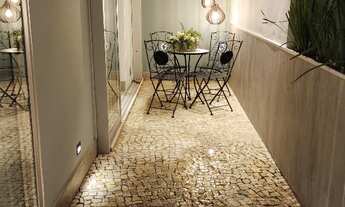 Imagem 4: Casa a venda no bairro Mangabeiras com moderno projeto arquitetônico e área social em conc