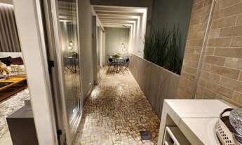 Imagem 2: Casa a venda no bairro Mangabeiras com moderno projeto arquitetônico e área social em conc