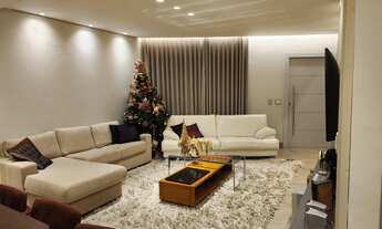 Imagem 5: Casa a venda no bairro Mangabeiras com moderno projeto arquitetônico e área social em conc