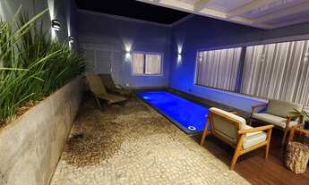 Imagem 7: Casa a venda no bairro Mangabeiras com moderno projeto arquitetônico e área social em conc