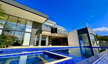 Imagem 3: Casa à venda no condomínio Vale dos Cristais com 5 quartos, sendo 5 suítes, sala para 4 am