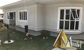 Imagem 2: Linda casa com 5 Dormitórios, sendo 4 suítes, 7 vagas de garagem, sala de jantar, sala de