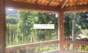 Imagem 5: Linda casa com jardim, piscina, sauna e suíte