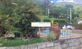 Imagem 5: Casa dúplex com 4 dormitórios, suite de hóspede, piscina e vista para as montanhas