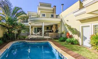 Imagem: 4 dormitórios, 4 suíte, 7 banheiro, 5