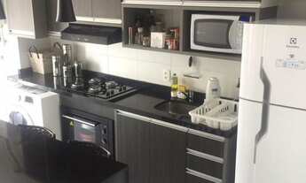 Imagem 7: Duplex lindo com Varanda, com uma paleta de cores contrastante que valoriza ainda mais o i