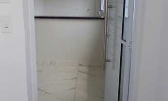 Imagem 3: Apartamento à venda no Centro de São Vicente-SP: 2 quartos, 1 suíte, 1 sala e 1 vaga de ga