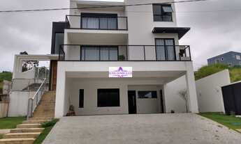 Imagem: Linda casa em um condomínio com muita área