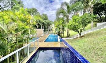 Imagem 4: ENCANTE-SE COM O CHARMOSO CONDOMÍNIO DE 29 CASAS EM ESTILO MODERNO