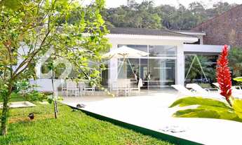 Imagem 6: Oásis de Luxo: Casa térrea com piscina, sauna e píer privativo à venda no condomínio Marin