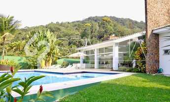 Imagem 3: Oásis de Luxo: Casa térrea com piscina, sauna e píer privativo à venda no condomínio Marin