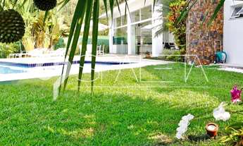 Imagem 4: Oásis de Luxo: Casa térrea com piscina, sauna e píer privativo à venda no condomínio Marin