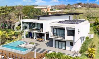 Imagem 2: Casa com arquitetura moderna à venda na Fazenda da Grama