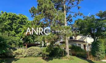 Imagem 7: FASCINANTE RESIDÊNCIA DE 530M², COM 4 SUÍTES, MUITO ESPAÇO E ÁREA VERDE EM CONDOMÍNIO FECH