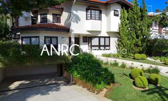 Imagem 2: FASCINANTE RESIDÊNCIA DE 530M², COM 4 SUÍTES, MUITO ESPAÇO E ÁREA VERDE EM CONDOMÍNIO FECH