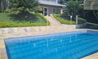 Imagem: Casa de Luxo no Condomínio Jardim das Palmeiras