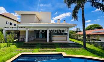 Imagem 4: Casa no Alphaville Campinas com 2 suítes no piso térreo e 2 quartos no piso superior