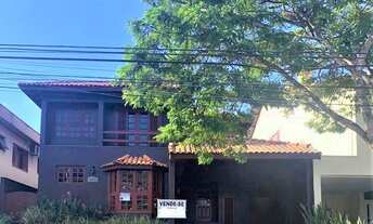 Imagem 1: Casa em Alphaville 11 | 350m2 | 4 dormitórios, sendo 2 suítes | Sala com lareira