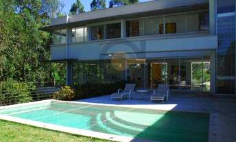 Imagem 1: Tamboré 01 | casa clean alto padrão | rodeada por verde | rodeada por vidros