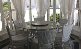 Imagem 6: 4 quartos todos suítes e 1 com closet Ar condicionado nas suítes Aquecimento solar Sala