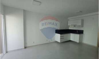 Imagem 3: Studio com planejados, box e fogão de indução