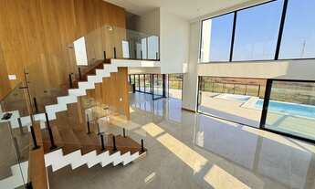 Imagem 6: Casa no Alphaville com 4 quartos sendo 4 suítes, piscina, fireplace, área gourmet, elevado