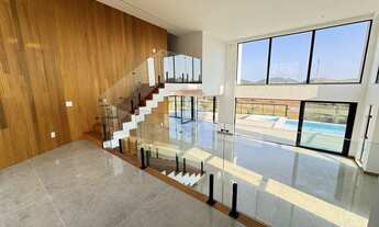 Imagem 2: Casa no Alphaville com 4 quartos sendo 4 suítes, piscina, fireplace, área gourmet, elevado