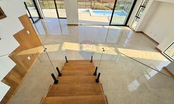 Imagem 5: Casa no Alphaville com 4 quartos sendo 4 suítes, piscina, fireplace, área gourmet, elevado