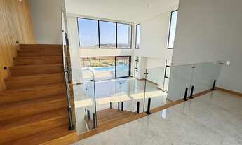 Imagem 3: Casa no Alphaville com 4 quartos sendo 4 suítes, piscina, fireplace, área gourmet, elevado