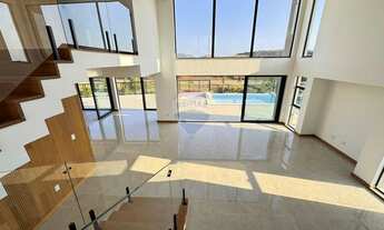 Imagem 4: Casa no Alphaville com 4 quartos sendo 4 suítes, piscina, fireplace, área gourmet, elevado