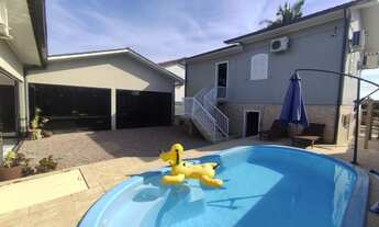 Imagem 3: CASA COM PISCINA VENDA NO BAIRRO ARGENTINA EM CRICIÚMA POSSUINDO 03 DORMITÓRIOS