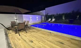 Imagem 6: Luxo e Conforto em Condomínio Fechado com Piscina em Bertioga