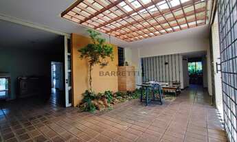 Imagem 2: Casa para locação com 1.212 m², contendo quatro quartos, três salas, quatro banheiros e qu