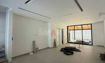 Imagem 5: Geminado alto padrão novo com 3 suítes e fundos com churrasqueira e pergolado