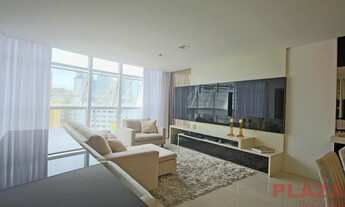 Imagem 5: Vista parcial do Mar - Com pele de vidro na sala, área de lazer completa