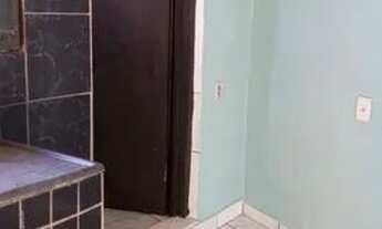 Imagem 2: Um quarto, cozinha, banheiro e uma lavanderia