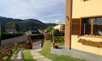 Imagem 6: Sobrado com 3 dormitórios à venda, 180 m² por R$ 1.500.000 - Vila Nova Suíça - Campos do J