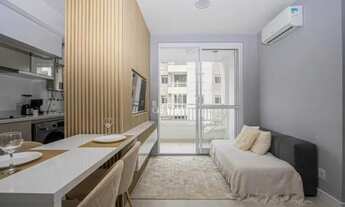 Imagem 2: Apartamento mobiliado com 2 dormitórios, sendo 1 suíte, no bairro Humaitá com VAGA/SACADA