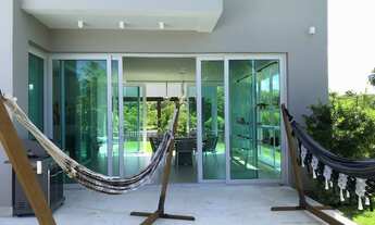 Imagem 4: Casa de condomínio para venda possui 630 metros quadrados com 5 quartos