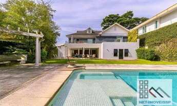 Imagem 2: Casa de Altíssimo Padrão 5 Dormitórios (700m²), 5 Suítes, Varanda, 4 Vagas. Próximo do Sho