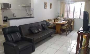 Imagem 1: Apartamento de 2 dormitórios mobiliado com vaga de garagem duas quadras da praia