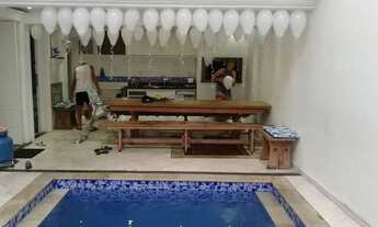 Imagem 2: Sobrado para aluguel possui 300 metros quadrados com 4 quartos em Ponta da Praia - Santos