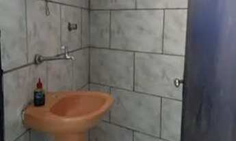 Imagem 4: Um quarto, cozinha, banheiro e uma lavanderia