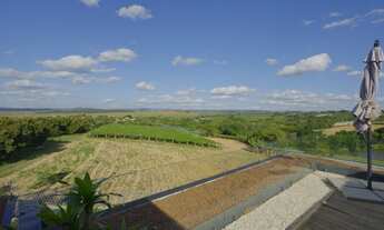 Imagem 3: Casa Moderna com projeto minimalista e quintal com jabuticabeira