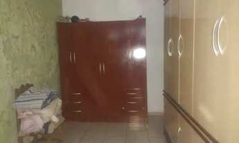 Imagem 4: Vendo terreno de fundos com casa de três andares