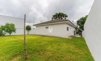 Imagem 2: Casa em condomínio reformada com 4 suítes e terreno de 487m2