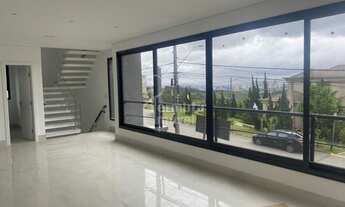 Imagem 2: Casa para alugar com 360 m², 2 suítes, sala de estar, cozinha e espaço gourmet no Residenc