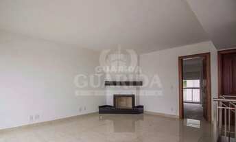 Imagem 2: Casa com 3 dormitórios suítes para alugar no Menino Deus, com TRÊS VAGAS e vista perene pa