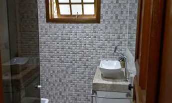 Imagem 7: Alugo casa de três quartos , sendo térrea . Santíssimo